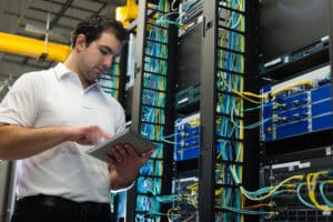 Technician working on school cyber servers
